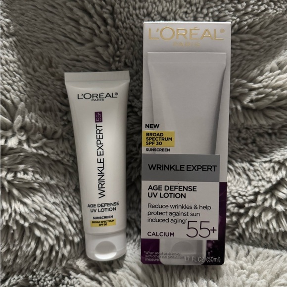 L'Oreal Other - L'Oreal White and Purple Wrinkle Expert Age Defense UV Lotion SPF 30